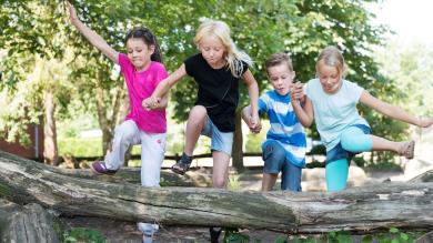 
		Children run and laugh
	